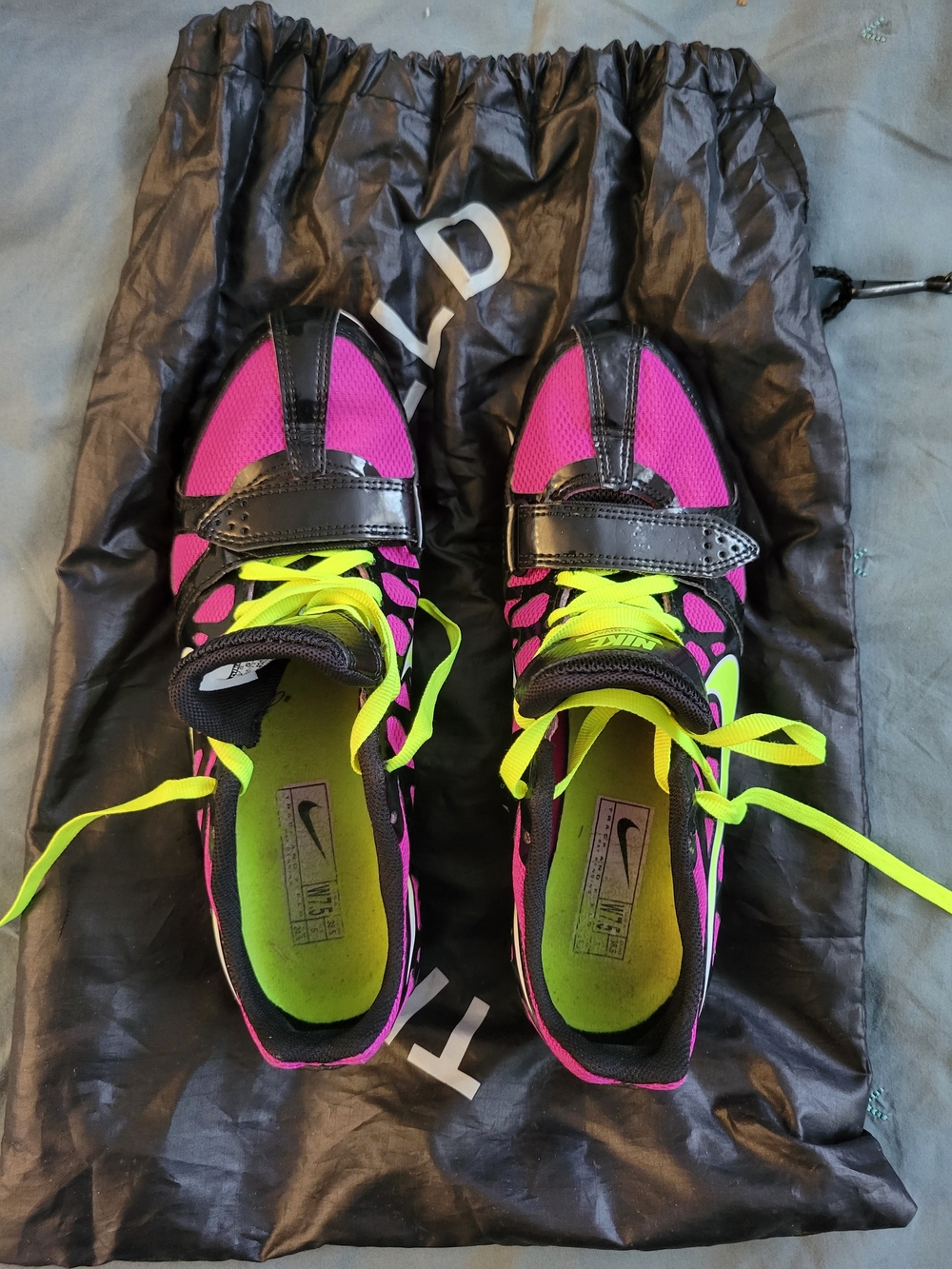 Nike Women’s Pink/Purple and Neon Yellow Athletic Sprinting Shoes